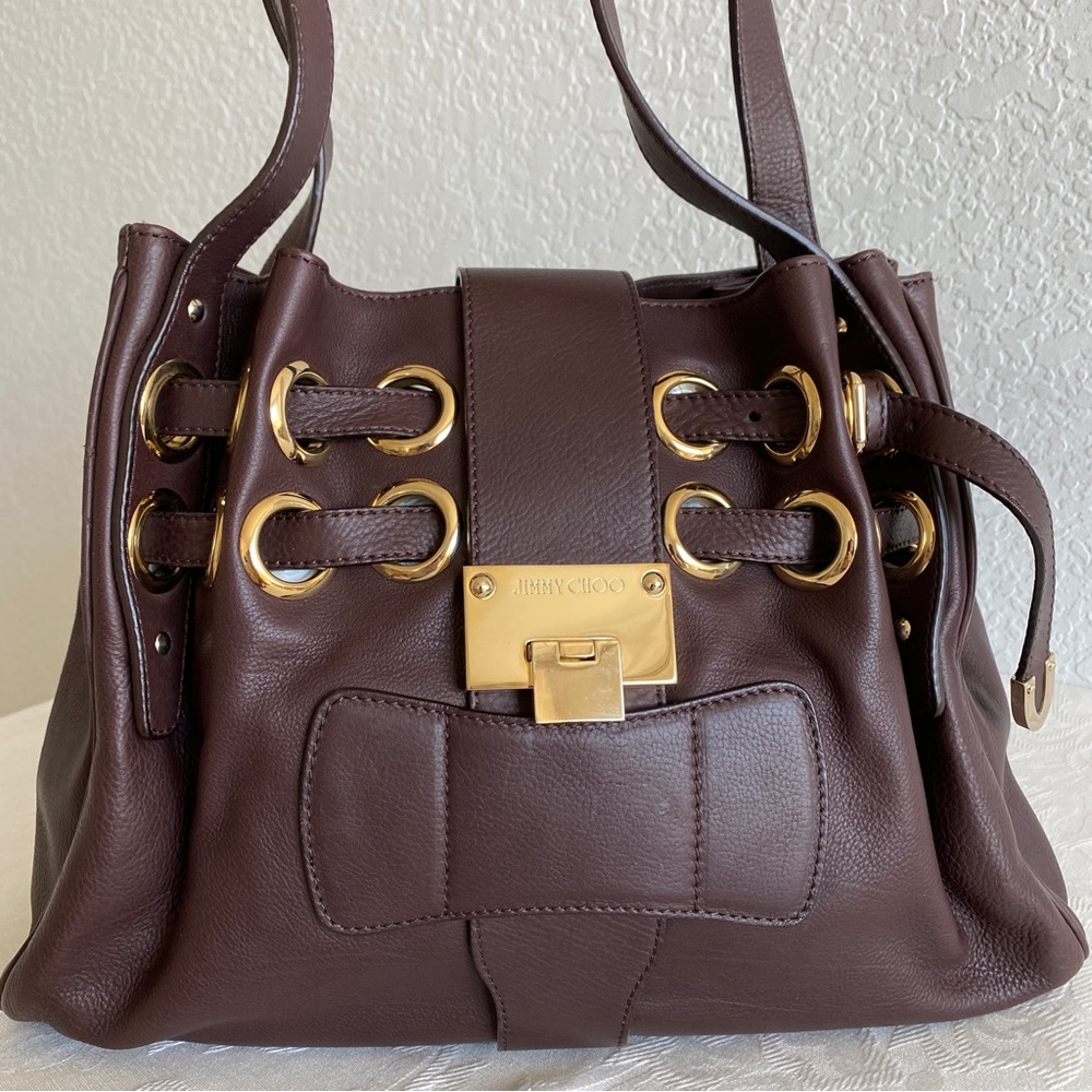 Jimmy choo brown grommets bag